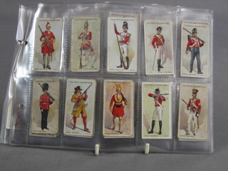 A set of 100 John Players Regimental Uniforms, the backs with brown stamp, cigarette cards 