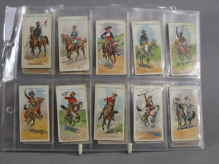 A set of 50 John Players Riders of the World 1905 cigarette cards