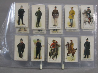 A set of Wills Police of the World cigarette cards   