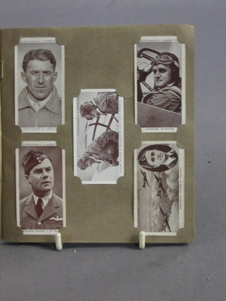 An album of Churchmans cigarette cards Kings of Speed and an album of Players Nature Series