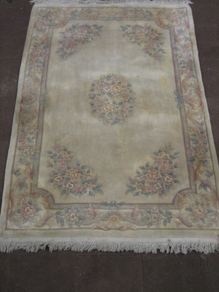 A 1930's cream ground and floral pattern Chinese rug 71" x 34"