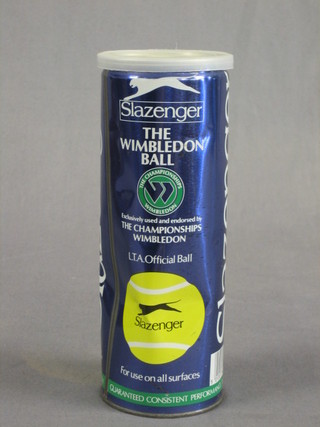 A metal tube containing 3 official 1988 LTA Wimbledon Slazenger tennis balls