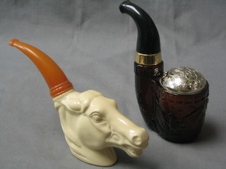 An Avon scent bottle for Wild Mustang Pipe in the form of a horses head and 1 other in the form of an American pipe