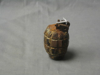 A Mills bomb (no pin, clip or spring)