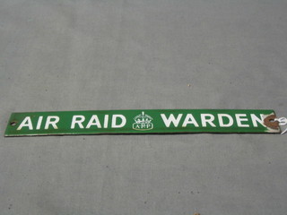 A green and white enamelled air raid warden's door sign 1" x 9" (slight damage to the edge)
