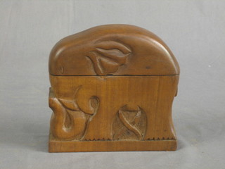 An Eastern hardwood cigarette box in the form of a standing elephant 7"