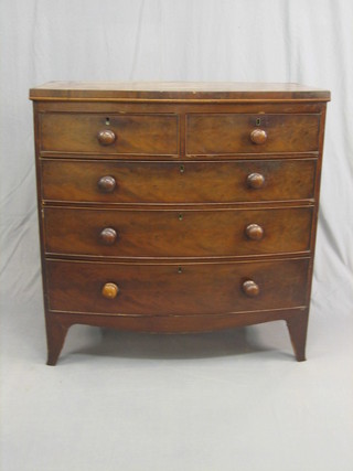 A 19th Century mahogany bow front chest of 2 short and 3 long drawers with tore handles, raised on splayed bracket feet 40"