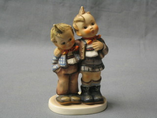 A Goebal figure group of two standing boys 5"