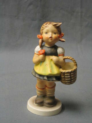A Goebal figure of  a standing girl with basket 5 1/2"