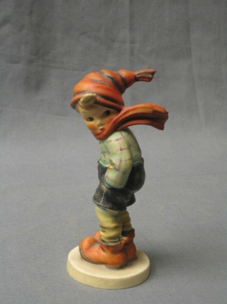 A Goebal figure of  a standing boy with hat and scarf 5"