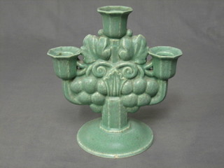 A green glazed Poole Pottery Sylvanware 3 light candelabrum, the base impressed 249, 9" high (chip to base and 2 sconce)