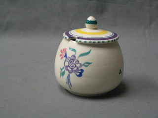 A circular Poole Pottery preserve jar and cover, base with Dolphin mark and impressed 288 3"