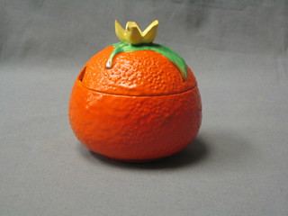 A Carltonware preserve jar in the form of an orange 5" (chip to finial)