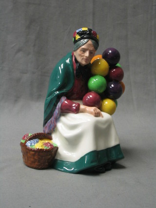 A Royal Doulton figure The Old Balloon Seller, HN1315