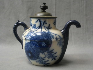 A blue and white Royles patent self pouring teapot