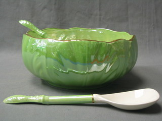 A circular Maling ware leaf shaped salad bowl, the base with green Malingware mark, 8 1/2" together with a pair of matching servers