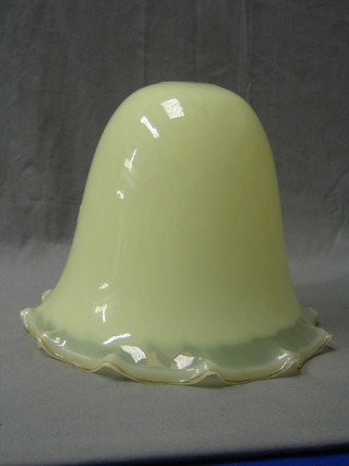 A "vaseline" glass coloured light shade 11"