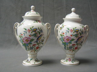 A pair of Aynsley Pembroke pattern urns and covers 9"