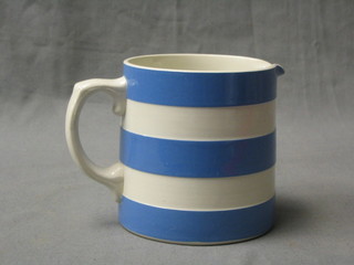 A T G Green Cornish kitchenware blue and white striped jug, the base with green shield mark, 4"