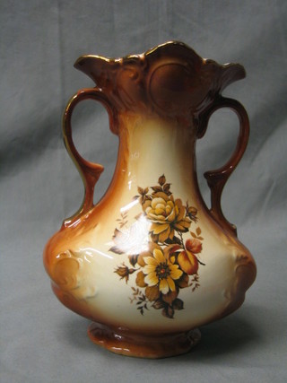A 20th Century Rockingham brown glazed twin handled vase with floral decorated, the base marked Rockingham England