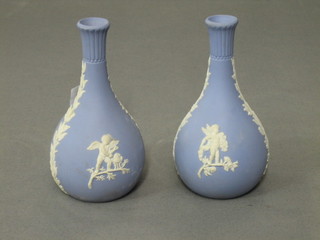 A pair of Wedgwood blue Jasperware club shaped vases, the bases impressed Wedgwood DW67 5"