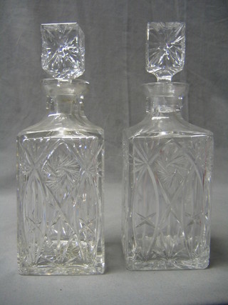 A pair of 20th Century cut glass spirit decanters and stoppers
