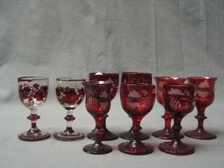 9 Bohemian red etched glass liqueur glasses
