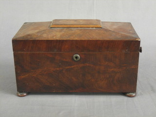 A 19th Century bleached mahogany twin compartment tea caddy of sarcophagus form with hinged lid, raised on 4 bun feet and with ring drop handles to the sides (f) 12"