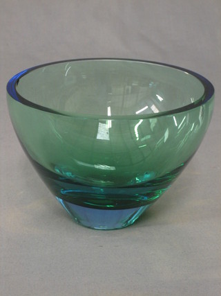 A circular green Art Glass bowl 7"