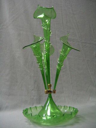 A handsome Victorian green glass table centre piece epergne with 3 trumpet shaped vases