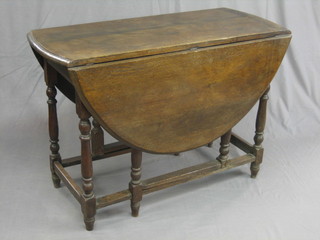 An 18th/19th Century oak drop flap gateleg dining table  40"