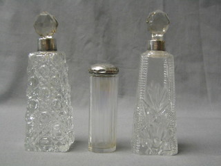 A cut glass pin jar with silver lid 4" and 2 cut glass dressing table bottles 7"
