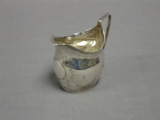 A George III engraved silver cream jug, London 1801, 2 ozs  (patched to front)