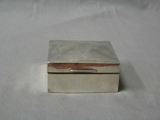 A silver cigarette box with hinged lid, inscribed, 3", marks rubbed