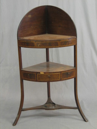 A 19th Century 2 tier mahogany corner wash stand, the base with undertier and raised on outstretched supports 22"