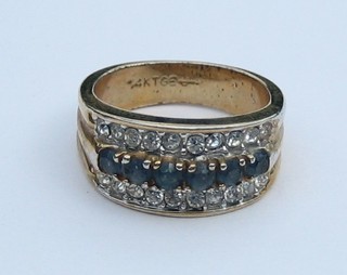 A lady's Continental gold dress ring set blue and white stones 