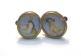 A pair 18th/19th Century enamelled studs decorated a lady and gentleman "Zug and Schaffhousen" (1 slightly damaged)