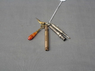 A miniature pair of gilt metal scissors, a button hook and 3 propelling pencils