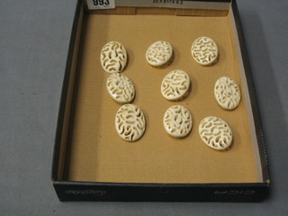 9 various pierced ivory buttons