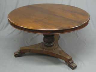 A Victorian circular snap top breakfast table, raised on a column with triform base 48"