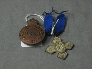 A Victorian 1898 Army Temperance Association 6 years medal together with a bronze Surrey Veteran's Reserve lapel badge