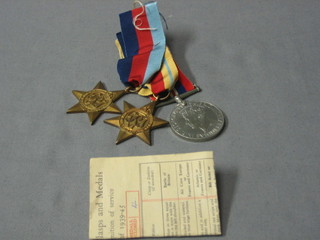 A group of 3 medals comprising 1939-45 Star, Africa Star and British War medal together with presentation certificate