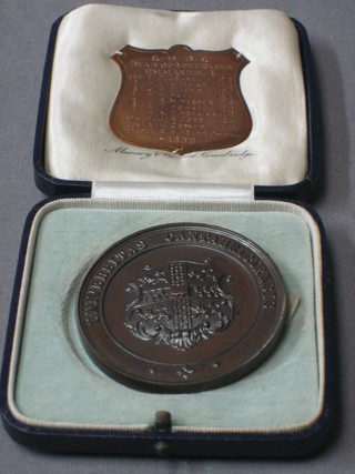 A bronze Cambridge University rowing medallion, cased