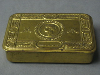 A WWI Princess Mary gift tin, containing packet of cigarettes and tobacco