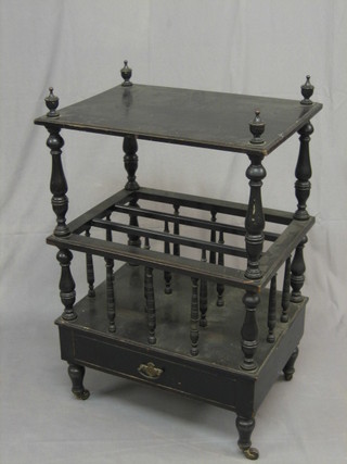 A Victorian mahogany ebonised what-not Canterbury, the base fitted a drawer, raised on turned supports 22" 