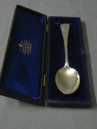 An Edwardian Scots silver Old English pattern christening spoon with bright cut decoration Glasgow 1904, cased