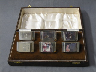 A set of 6 silver napkin rings, Birmingham 1937 4 ozs