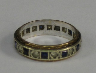 A lady's eternity ring set blue and white stones