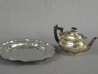 An oval silver plated teapot with demi-reeded decoration and a square silver plated dish 13"