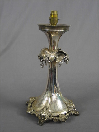 A Victorian embossed and engraved silver plated table centre piece of vinery form, converted to an electric table lamp 14"